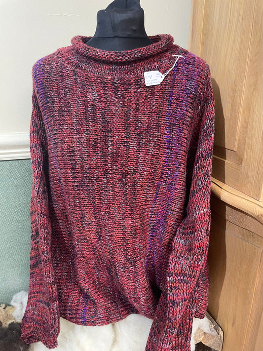 Coloured knitted roll neck jumper