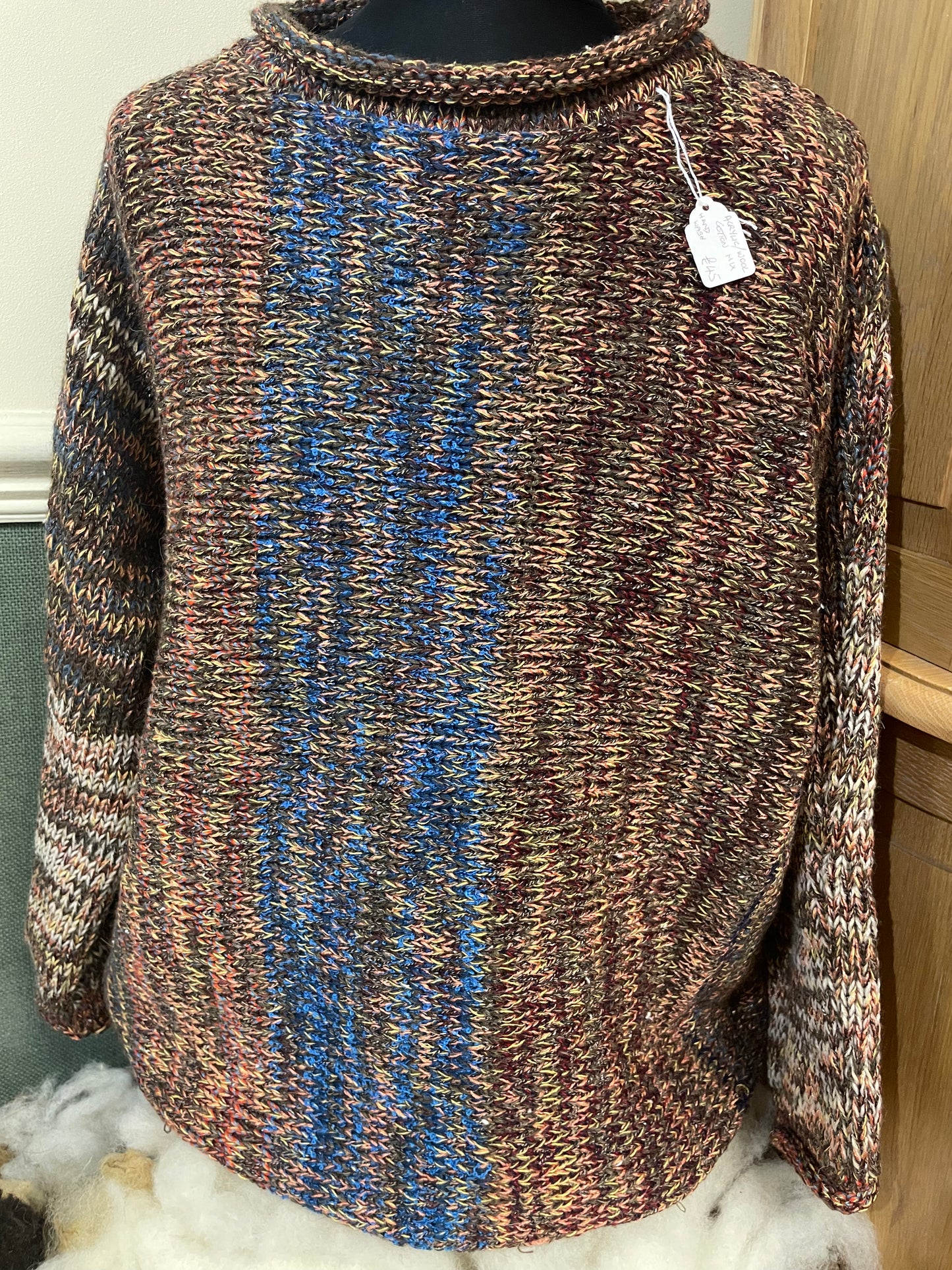 Coloured knitted roll neck jumper