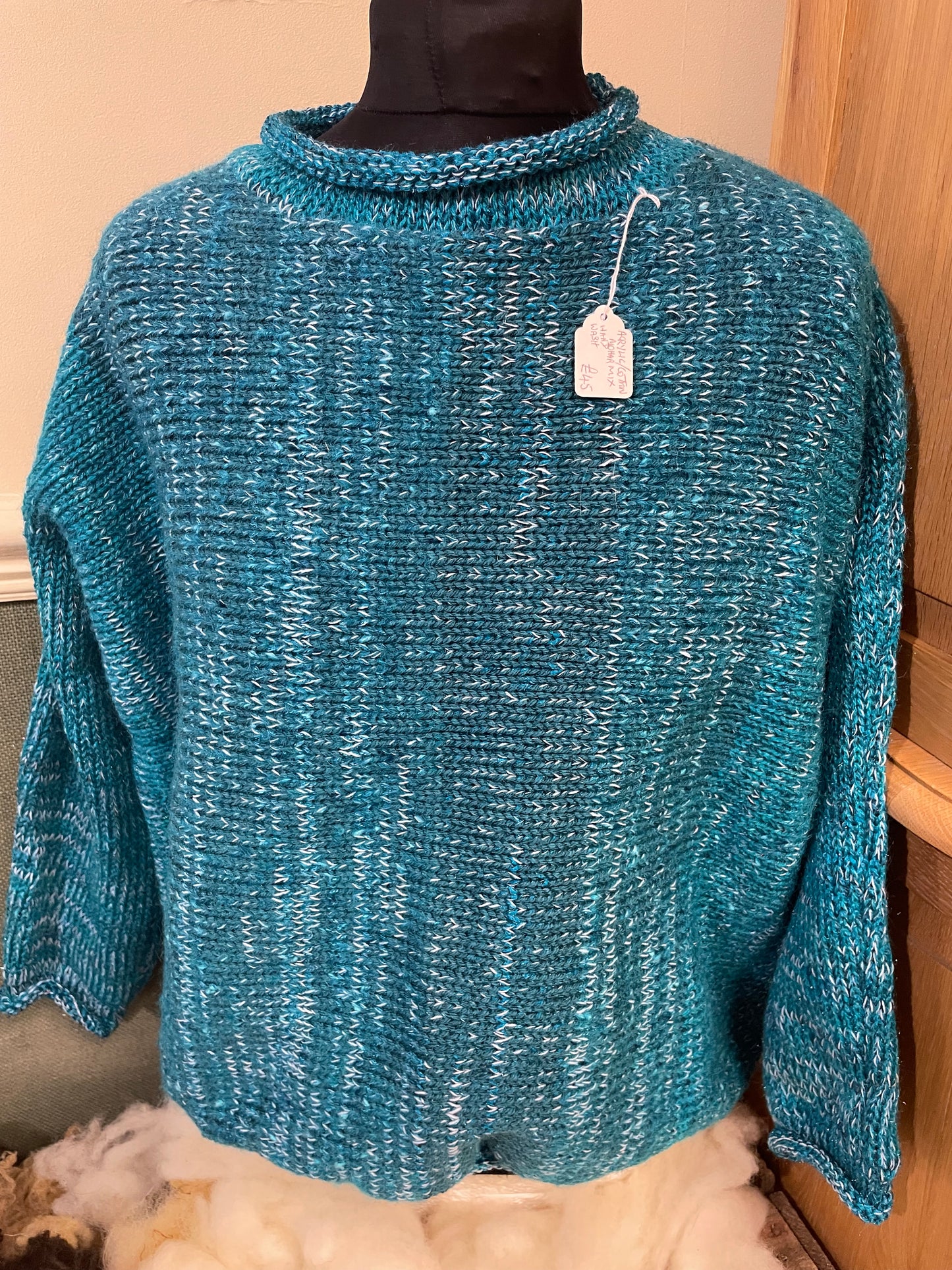 Coloured knitted roll neck jumper