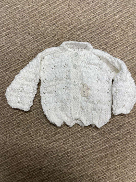 White babie’s  Cardigan 0-3 months