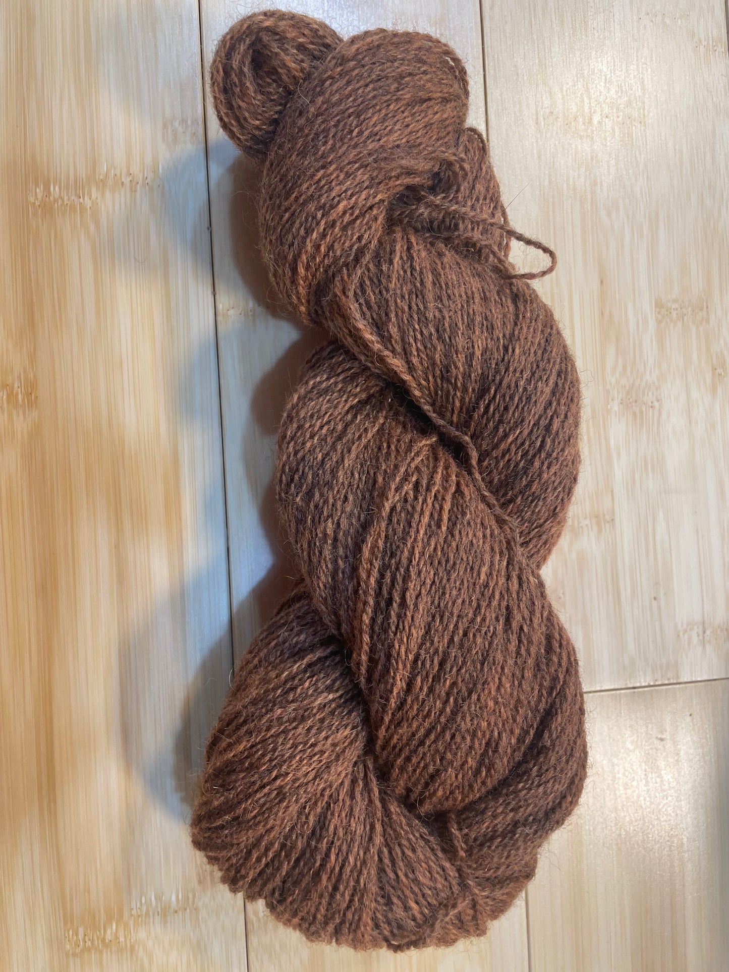Four Ply Sock 100 gm 100 % organically dyed wool Curly Mob Flock burnt ocre