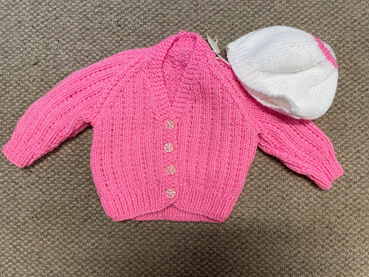 Pink coloured children’s Cardigan 0-3 months