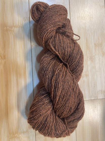 4 ply 100 gm 100 % organically dyed wool Curly Mob Flock burnt ocre